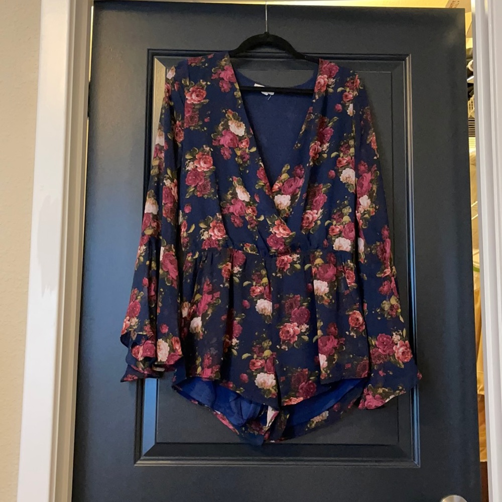 Floral romper (runs a size down)